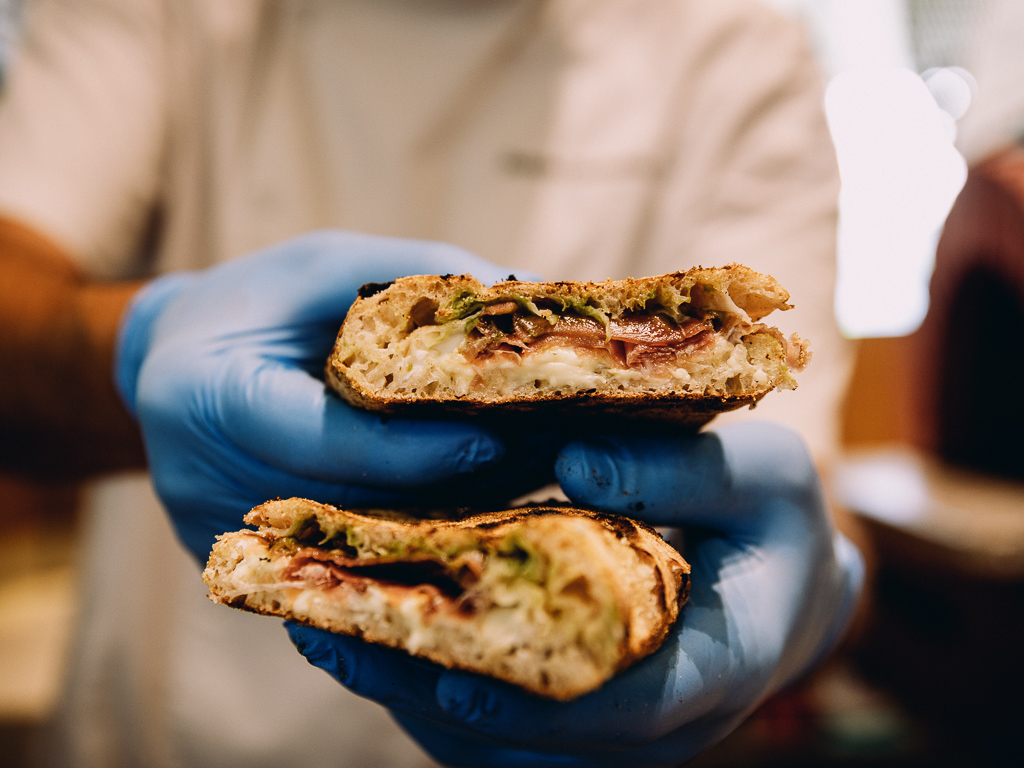 The Saporito panuozzi features mozzarella cheese, parma ham and ricotta cheese topped with the house basil sauce. Photo: Ravin Thiruchelvam/HungryGoWhere Daniele’s Pizza