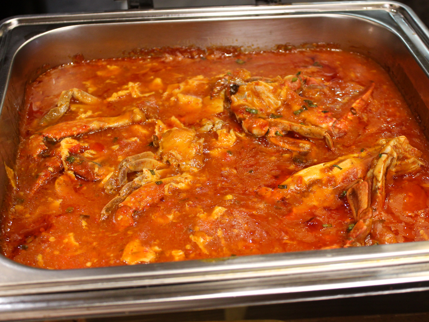 Chilli crabs in a sauce that’s great for dipping your mantou in. Photo: Angeline Ang/HungryGoWhere permata singapore