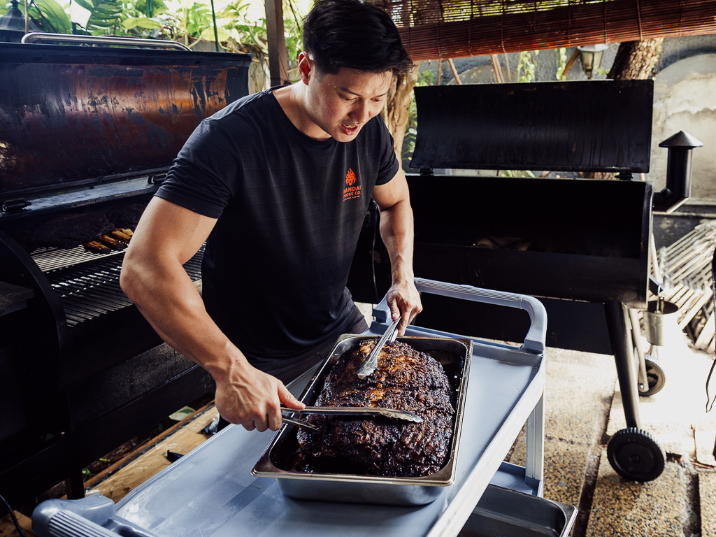 Royston preparing the meat for smoking. Photo: Ravin Thiruchelvam/HungryGoWhere mandai smoke co