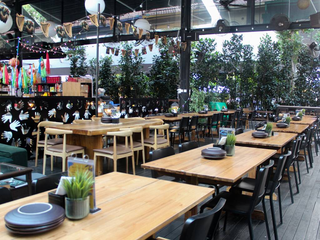 The outdoor space offers plenty of seating. Photo: Angeline Ang/HungryGoWhere esquinita by konyo cuppage terrace