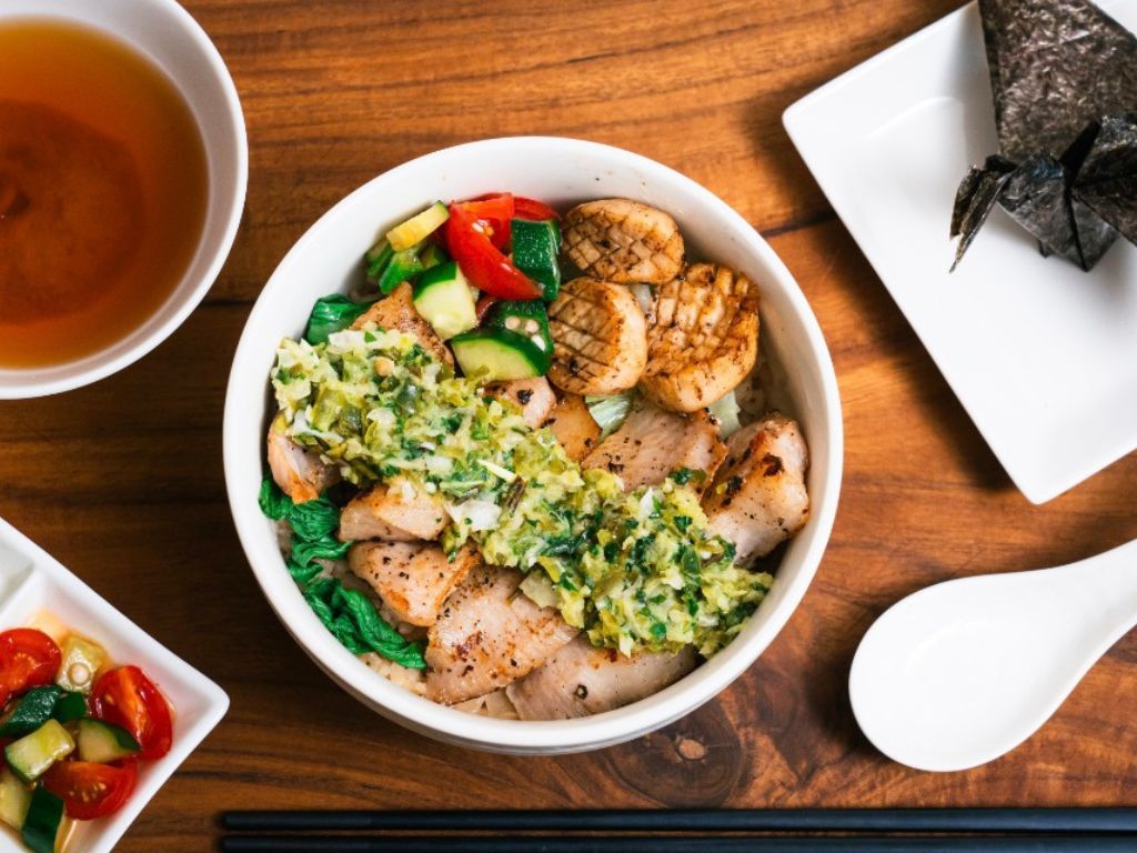 Indulge in smoky pork jowl donburi that are easy on the wallet. Photo: CheekyDon/Facebook millenia walk food