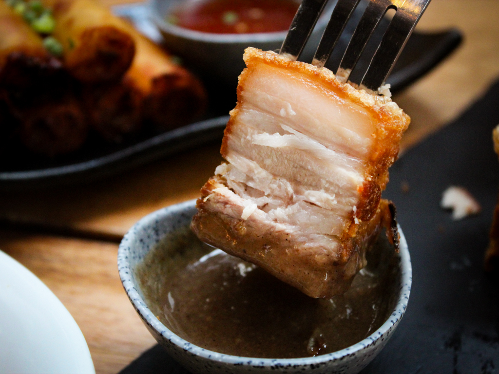 A closer look at the lechon kawali with shatteringly crisp skin. Photo: Angeline Ang/HungryGoWhere esquinita by konyo cuppage terrace