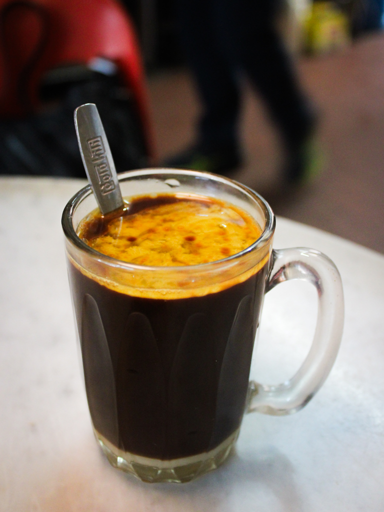 The semi-melted butter will need a good stir to fully dissolve. Photo: Angeline Ang/HungryGoWhere heap seng leong coffeeshop