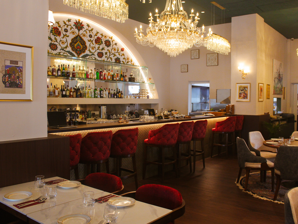 Chandeliers illuminate the dining space. Photo: Angeline Ang/HungryGoWhere shirazi dempsey hill