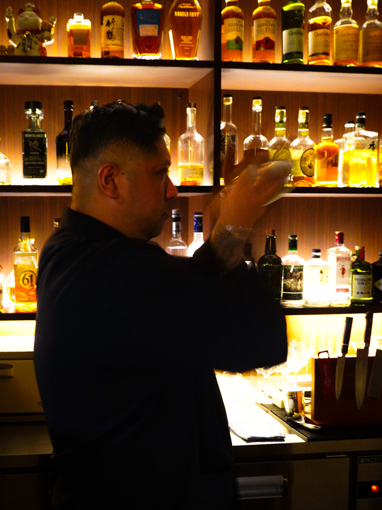 Owner Gavin is quite the seasoned bartender. Photo: Evan Mua/HungryGoWhere bar middle