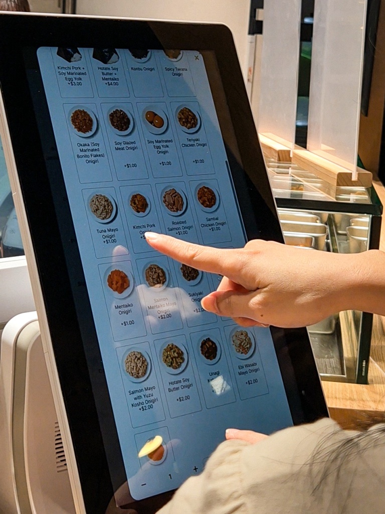Order and pick your onigiri filling of choice via QR codes or at a kiosk. Photo: Sarah Chua/HungryGoWhere Tokyo Onigiri Singapore