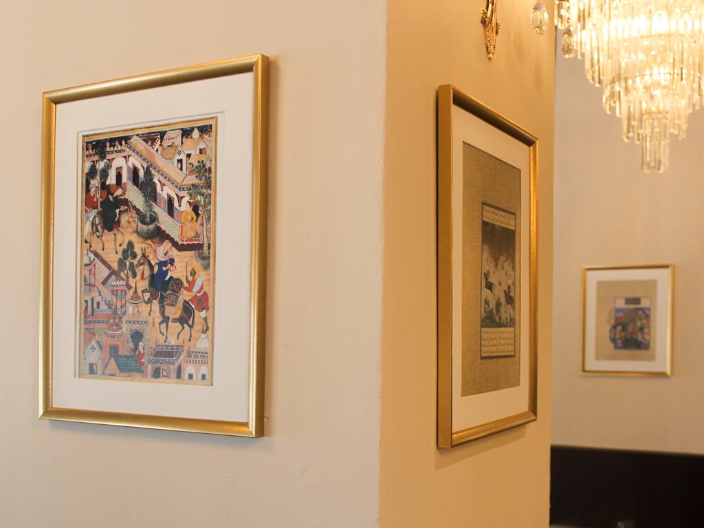 Paintings adorn the walls. Photo: Angeline Ang/HungryGoWhere shirazi dempsey hill