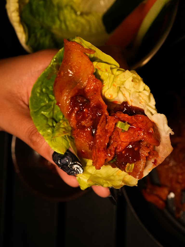 Wrap the pork with the lettuce and a dab of ssamjang for a really good bite. Photo: Roma Chonkar/HungryGoWhere Jeju Haenyeo