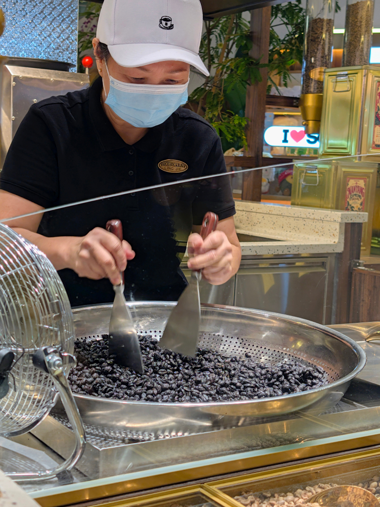 Beans are roasted on-site at this Toast Box stall. Photo: Zawani Abdul Ghani/HungryGoWhere food opera ion orchard