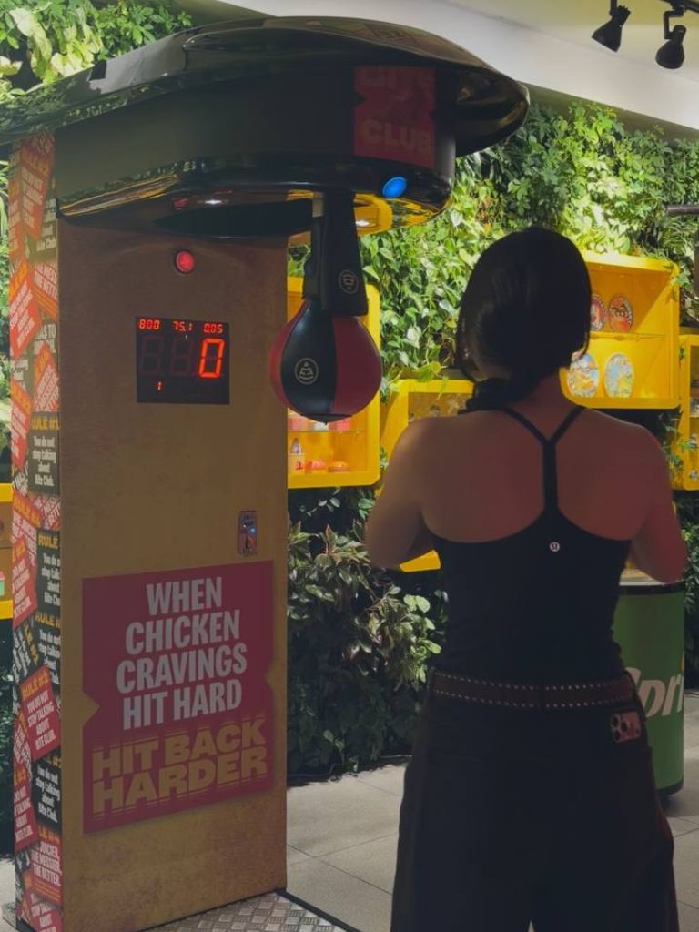 Think you can set a new high score on the punching bag? Photo: Shannon Ong/HungryGoWhere McDonald’s Bite Club