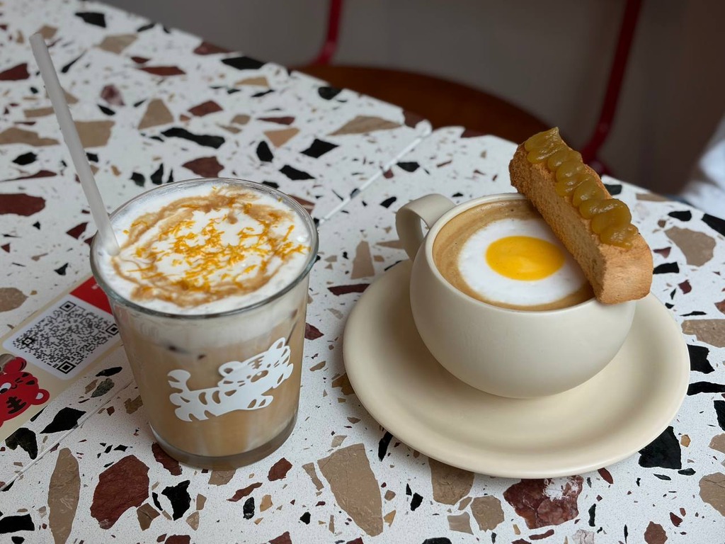 From left: Tiger Bomb, Singapore Breakfast latte. Photo: Shannon Ong/HungryGoWhere rawr cafe
