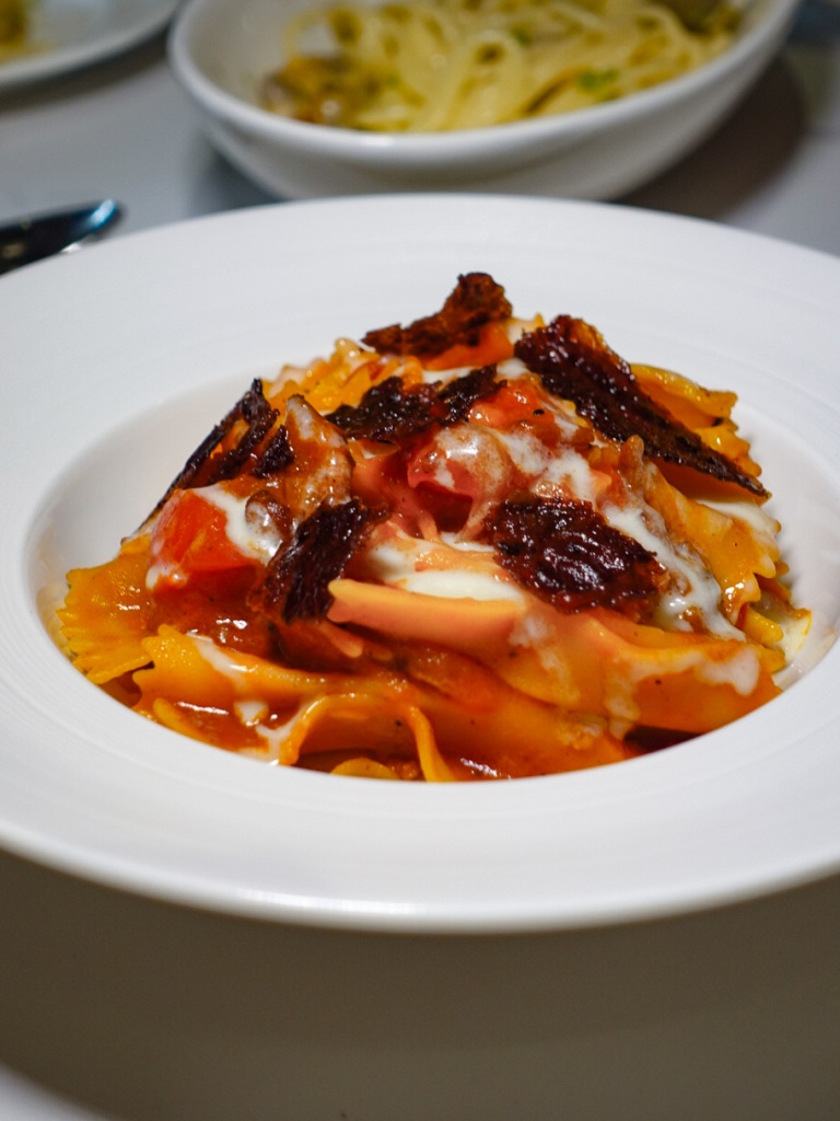 The handmade ribbon-shapped farfalle pasta for this alone was immaculate. Photo: Sarah Chua/HungryGoWhere Osteria Da Su Telok Ayer