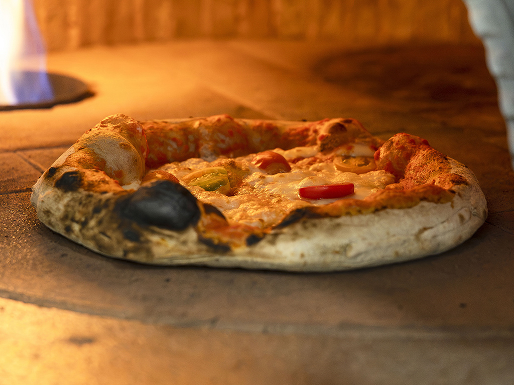 Pizza being flash-baked in the oven. Photo: Koh Mui Fong/HungryGoWhere jr pizzeria alkaff crescent